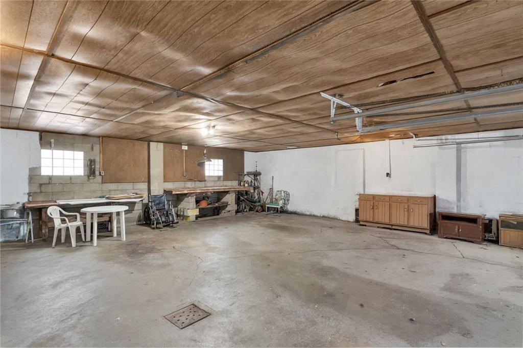 6656 Portersville Rd /state Rt 488 Portersville, PA 16051 - Photo 28 of 39 The garage offers room for multiple vehicles with space left over for projects.