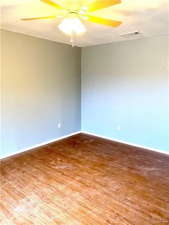 a view of a room with an empty space