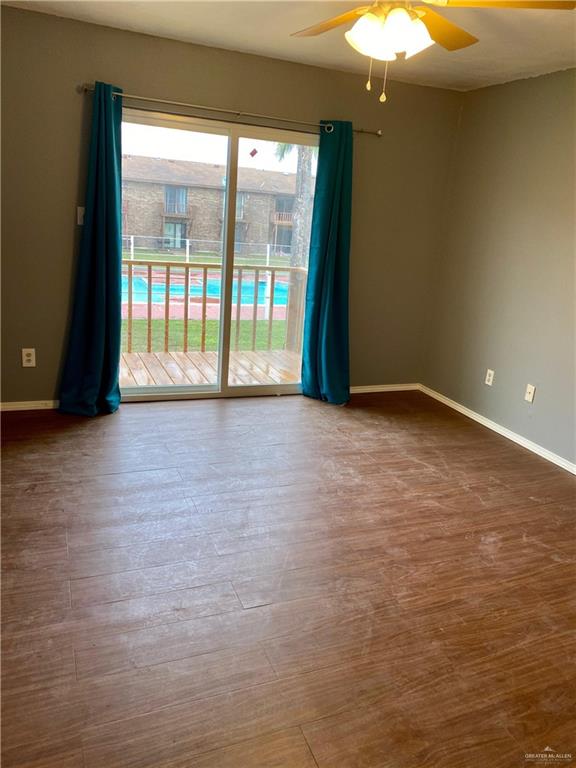 2201 South Jackson Road, Unit M34 Pharr, TX 78577 - Photo 3 of 23 a view of an empty room with a window