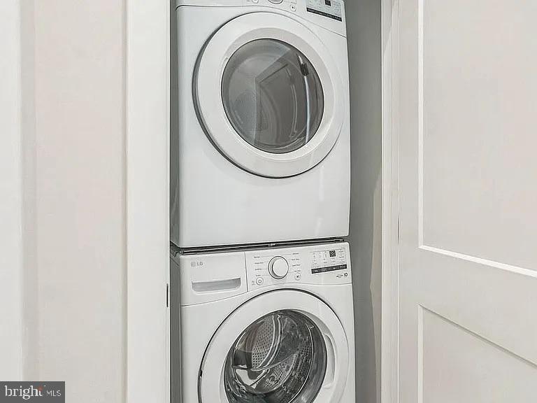 1243 North 26th Street, Unit 4 Philadelphia, PA 19121 - Photo 15 of 18 a utility room with dryer and washer
