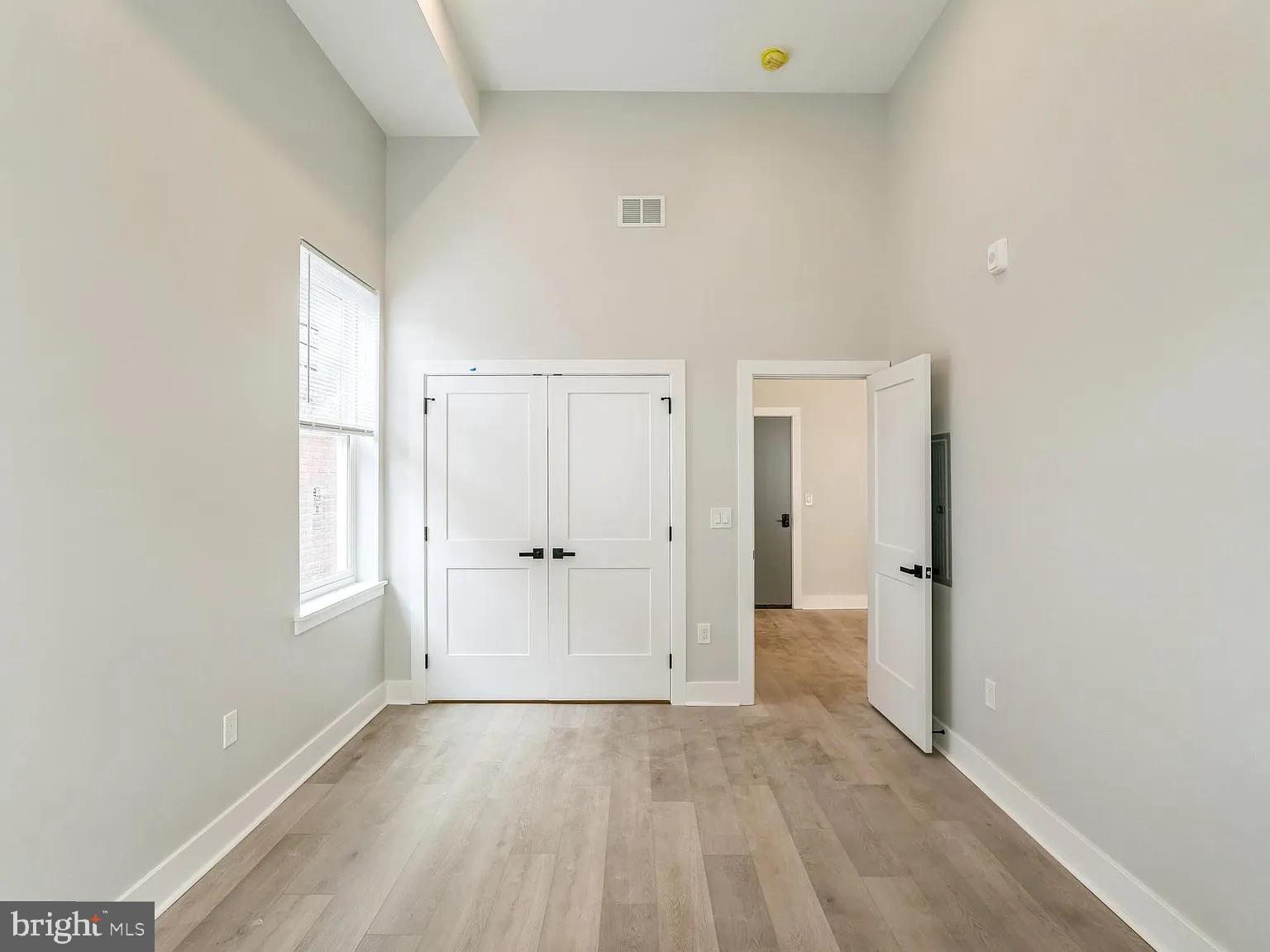 1243 North 26th Street, Unit 4 Philadelphia, PA 19121 - Photo 16 of 18 a view of an empty room and window