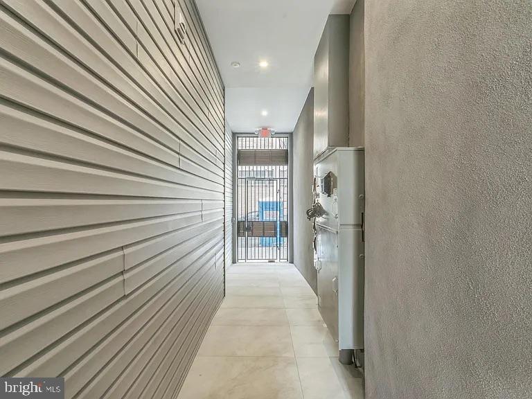 1243 North 26th Street, Unit 4 Philadelphia, PA 19121 - Photo 9 of 18 a view of a hallway with wooden floor