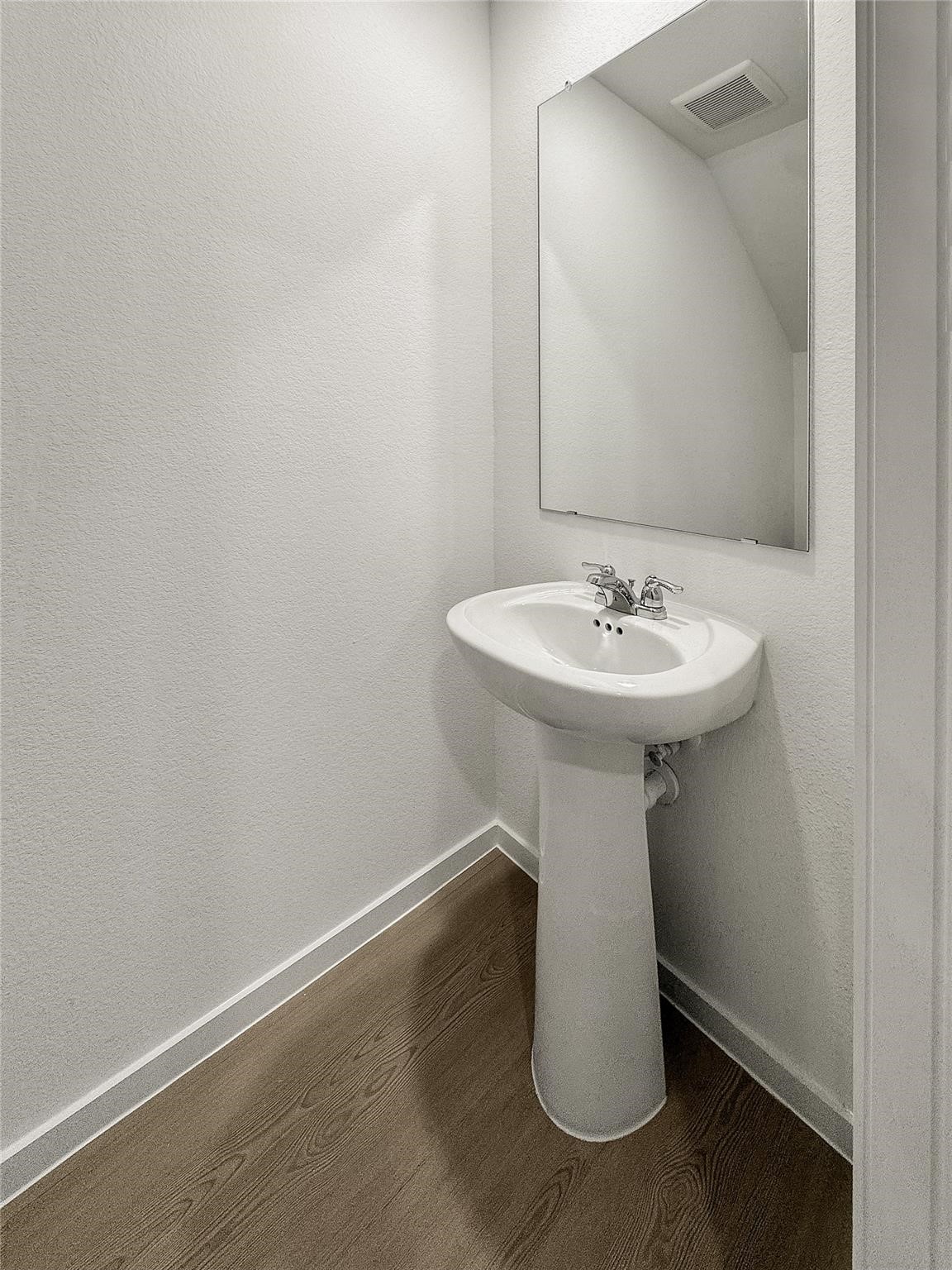 12430 Wild Strawberry Road Houston, TX 77038 - Photo 12 of 34 Half bath on first floor