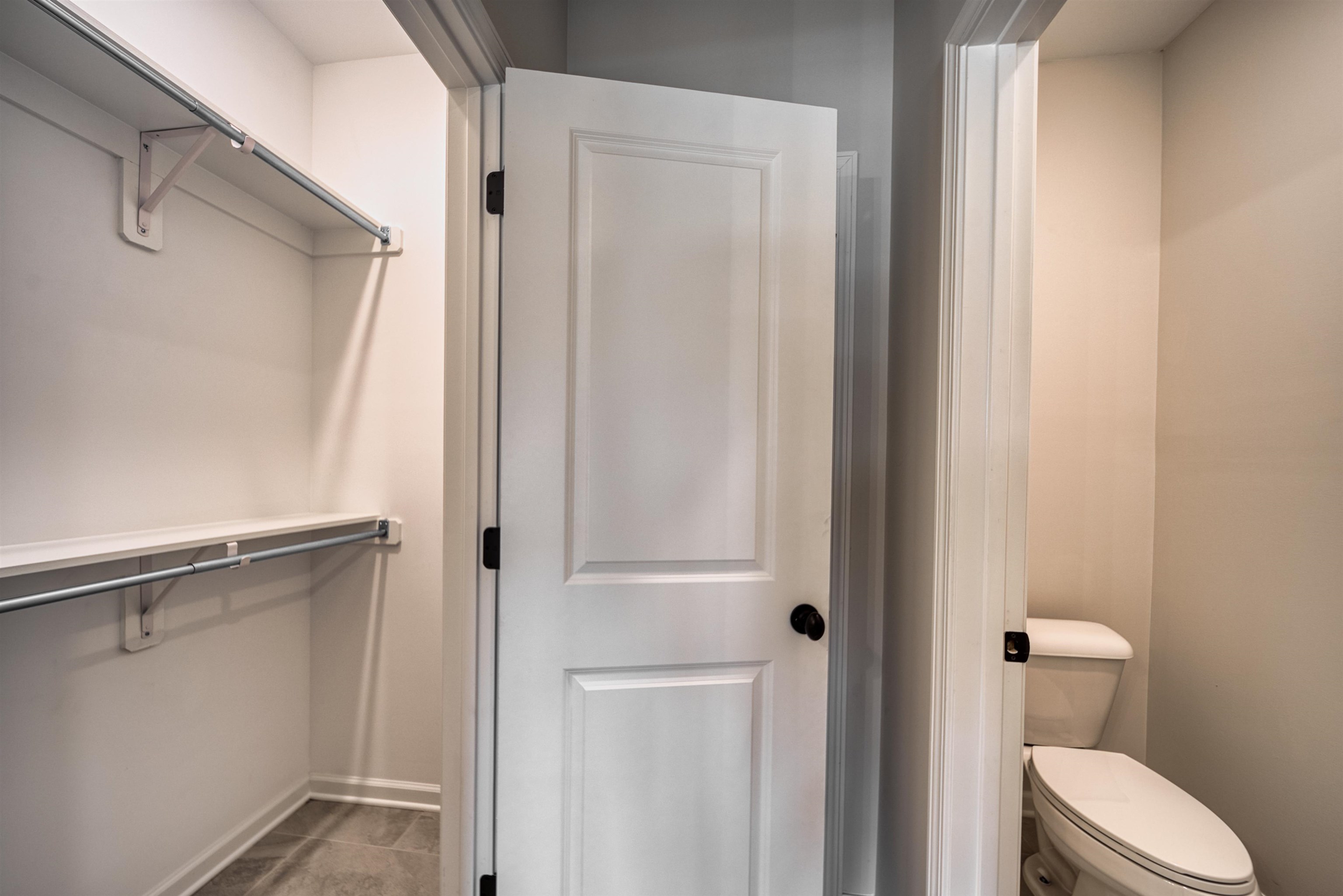 32 Forsyth Lane Munford, TN 38058 - Photo 26 of 35 a bathroom with a shower and toilet