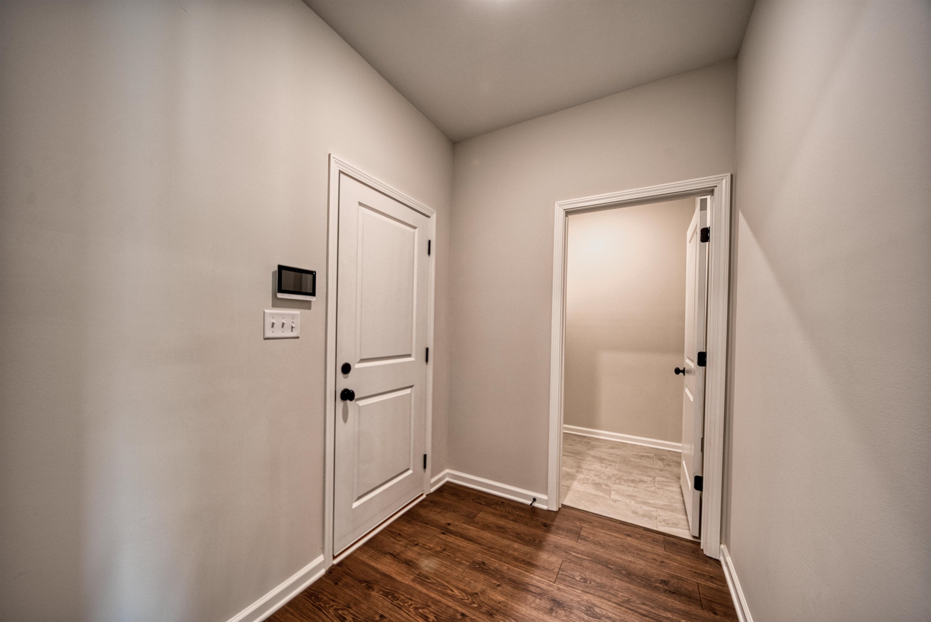 32 Forsyth Lane Munford, TN 38058 - Photo 27 of 35 a view of hallway with wooden floor