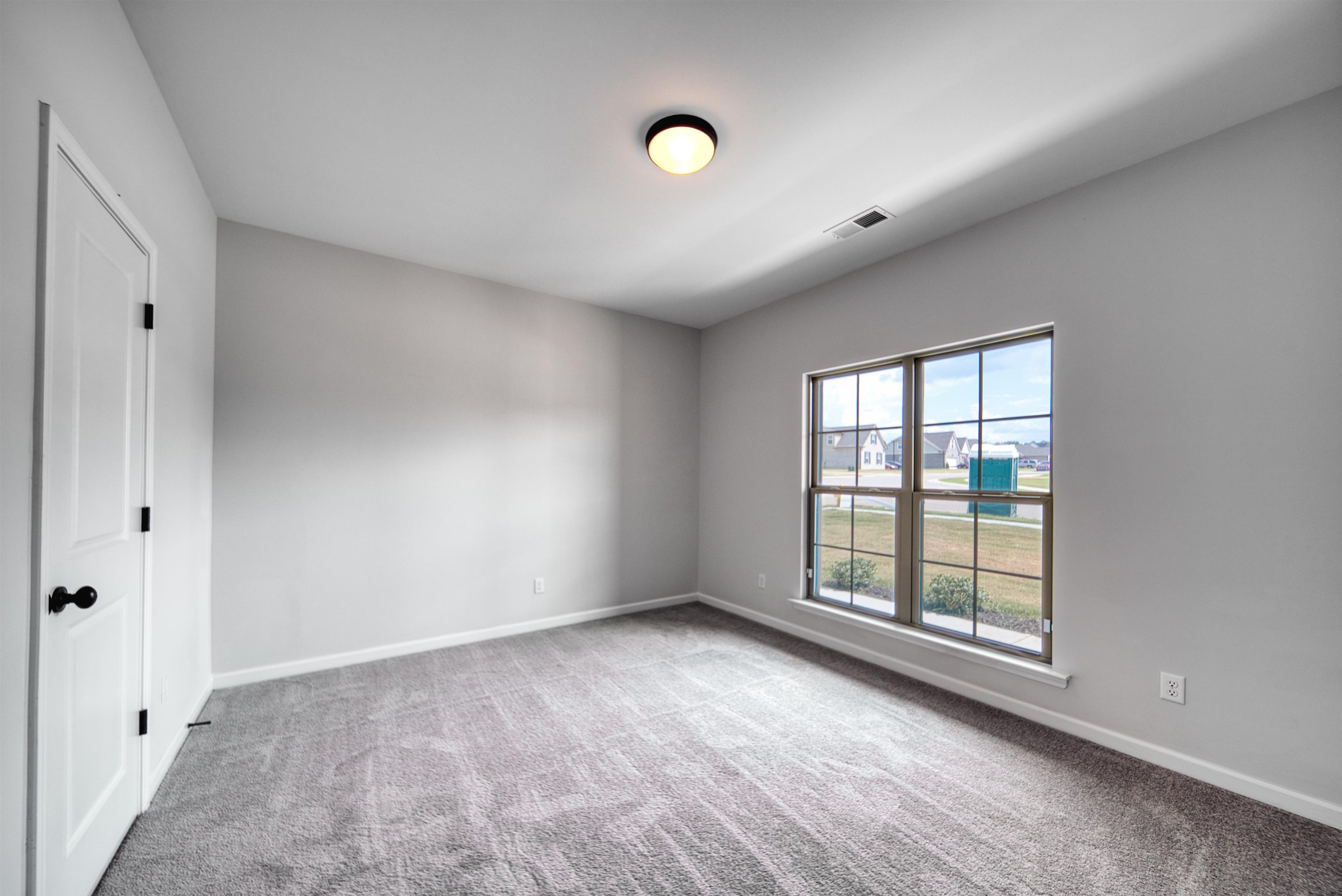 32 Forsyth Lane Munford, TN 38058 - Photo 28 of 35 wooden floor in an empty room with a window