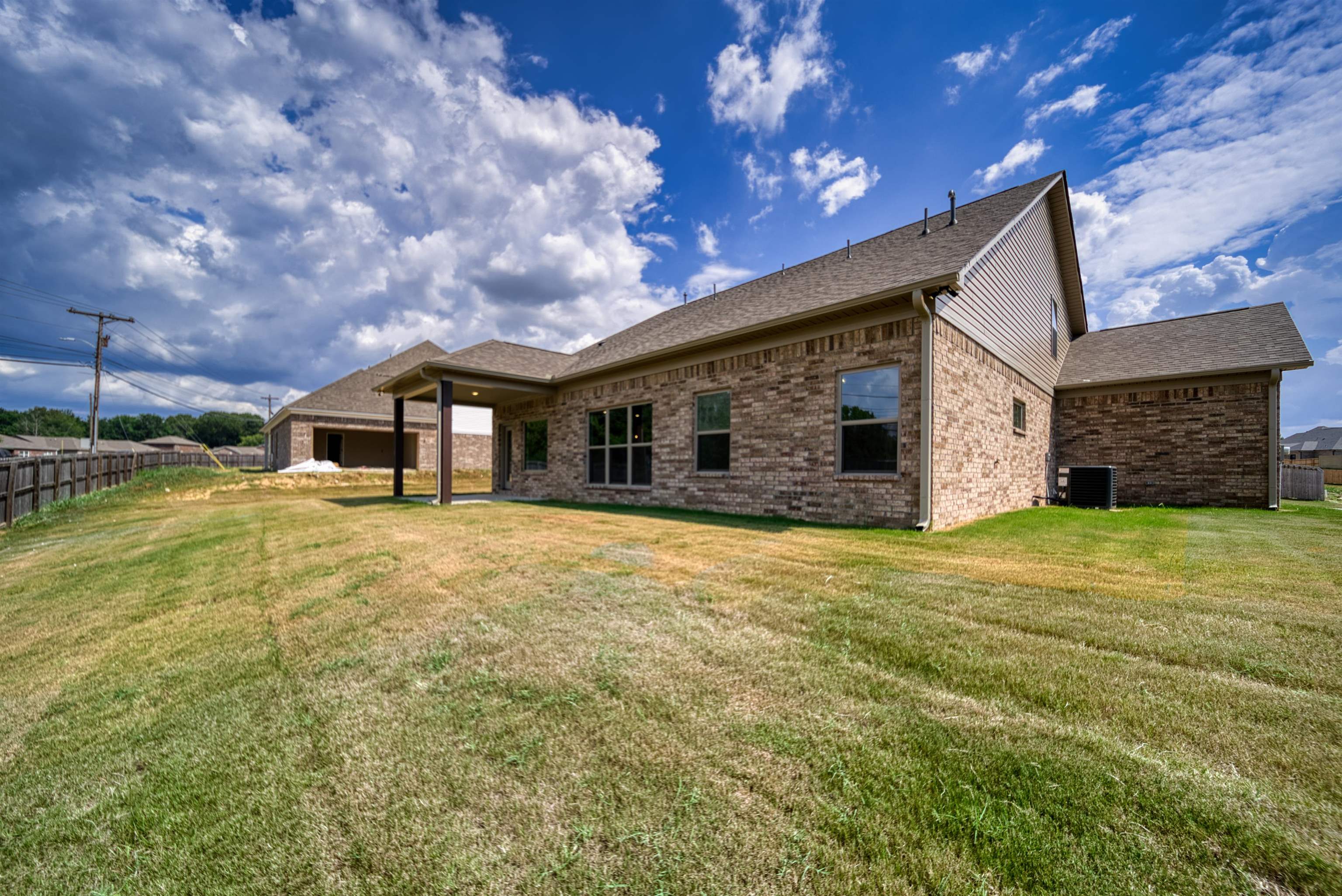 32 Forsyth Lane Munford, TN 38058 - Photo 32 of 35 a front view of a house with a yard