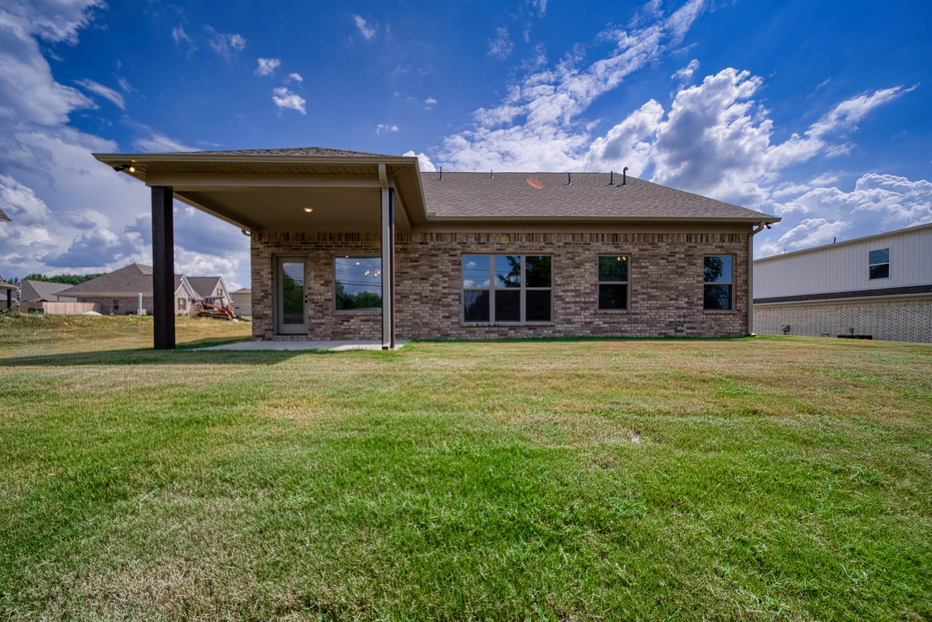 32 Forsyth Lane Munford, TN 38058 - Photo 33 of 35 a view of a house with a yard