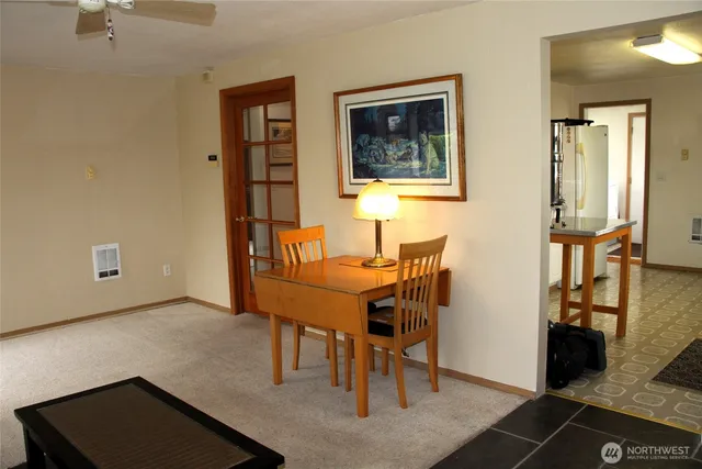 a view of a dining room with furniture