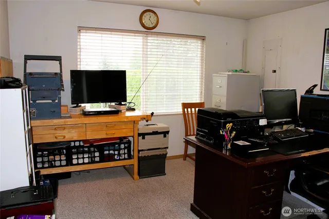 a room with furniture and flat screen tv