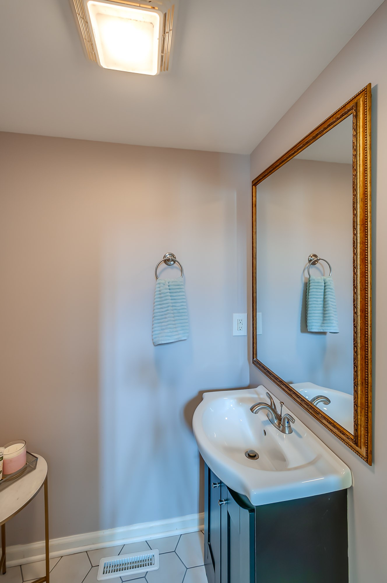 431 Maple Street Madison, TN 37115 - Photo 14 of 42 a bathroom with a sink and a mirror
