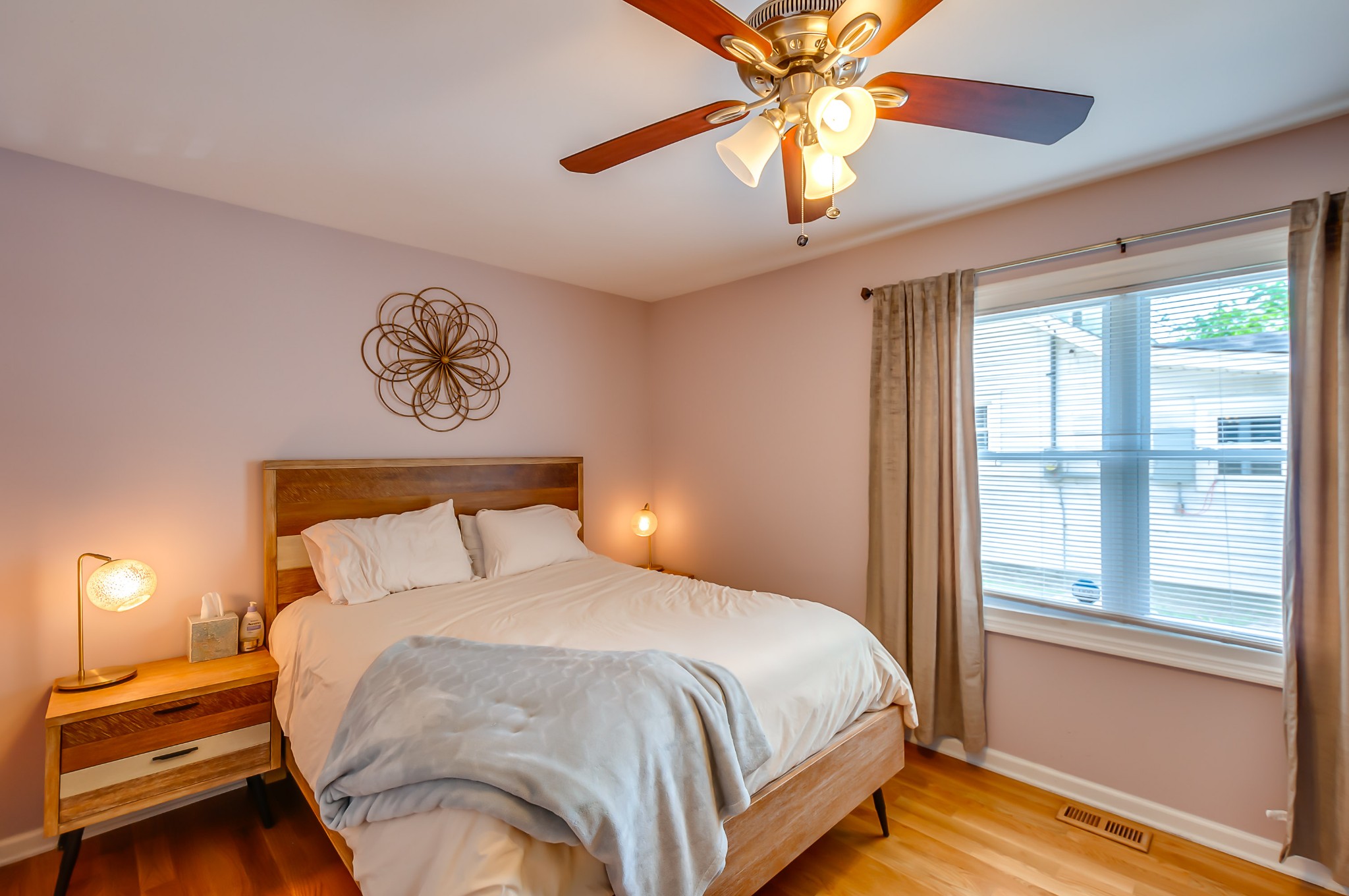 431 Maple Street Madison, TN 37115 - Photo 15 of 42 a bedroom with a bed and a window