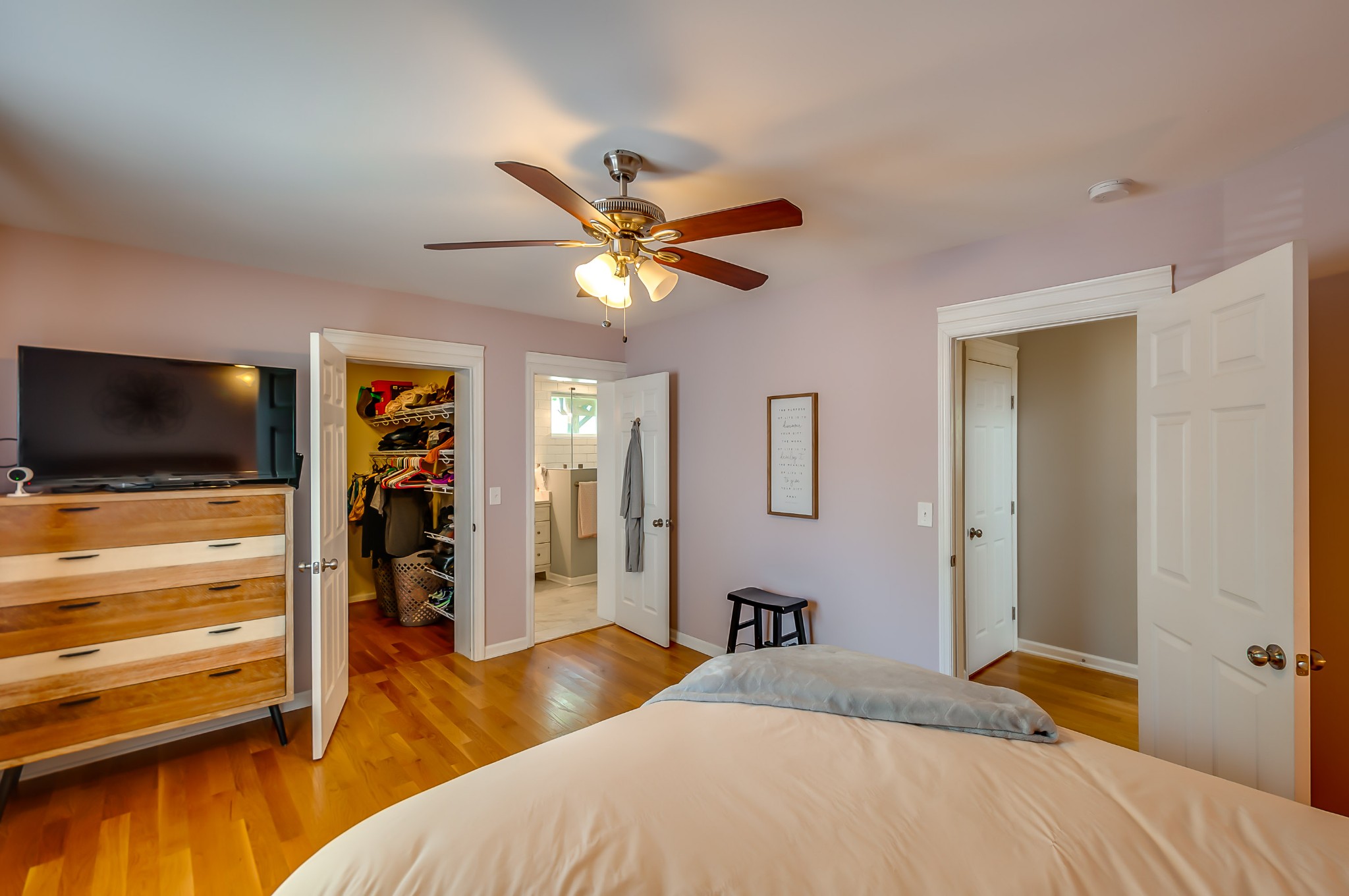 431 Maple Street Madison, TN 37115 - Photo 17 of 42 a bedroom with a bed and a flat screen tv