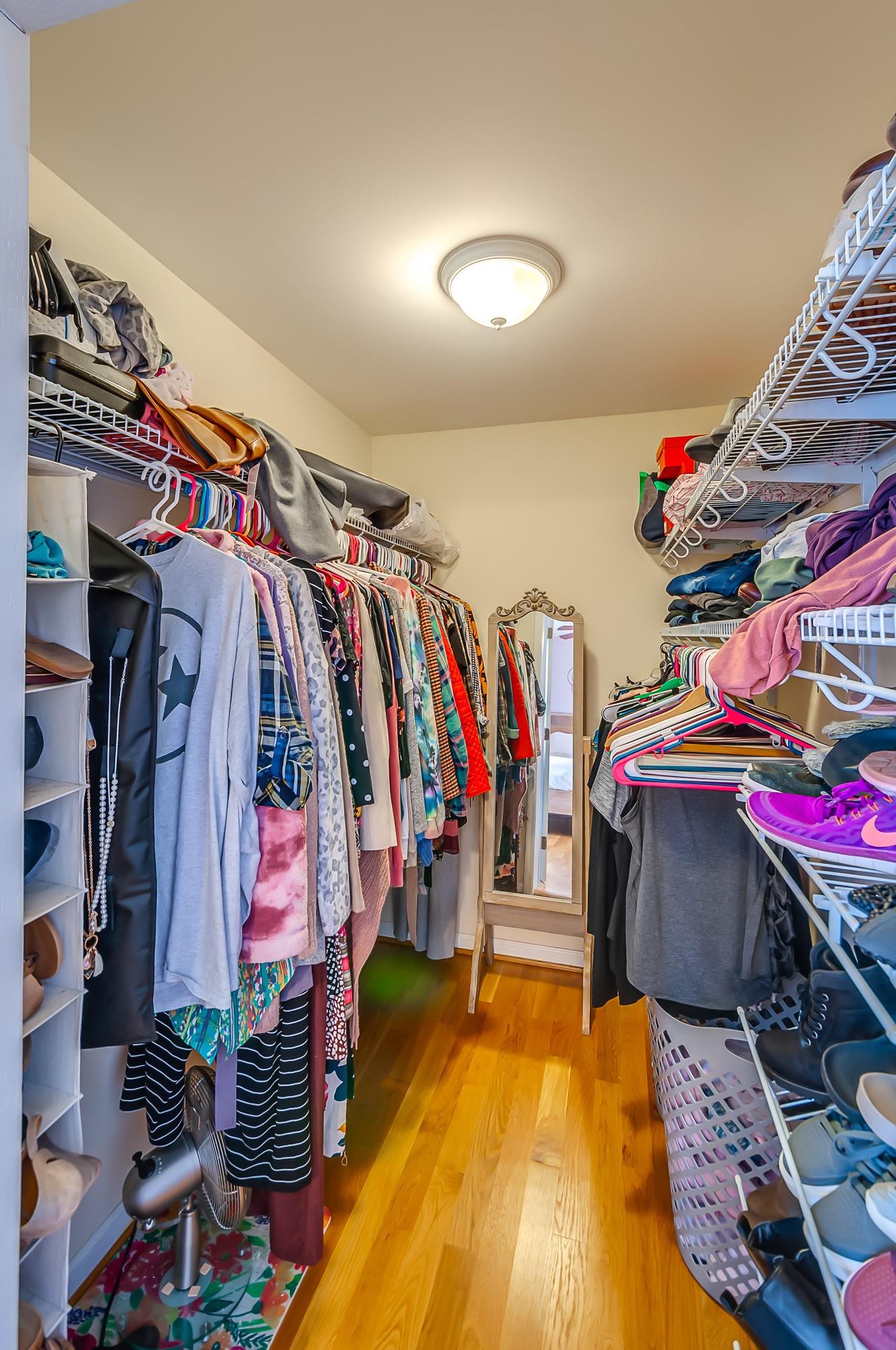 431 Maple Street Madison, TN 37115 - Photo 18 of 42 a view of walk in closet with clothes and shoes