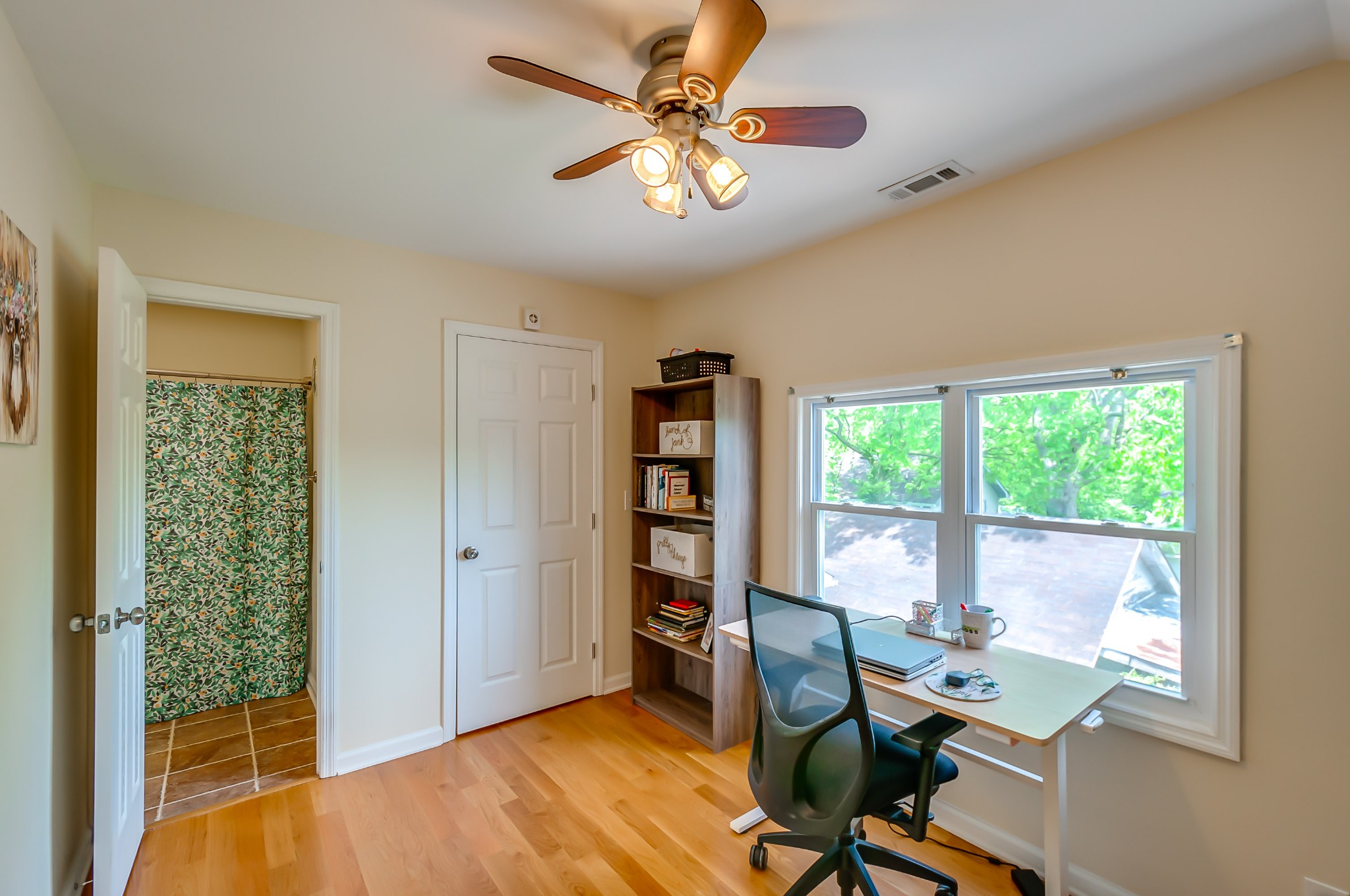 431 Maple Street Madison, TN 37115 - Photo 22 of 42 a view of a workspace with furniture and a window