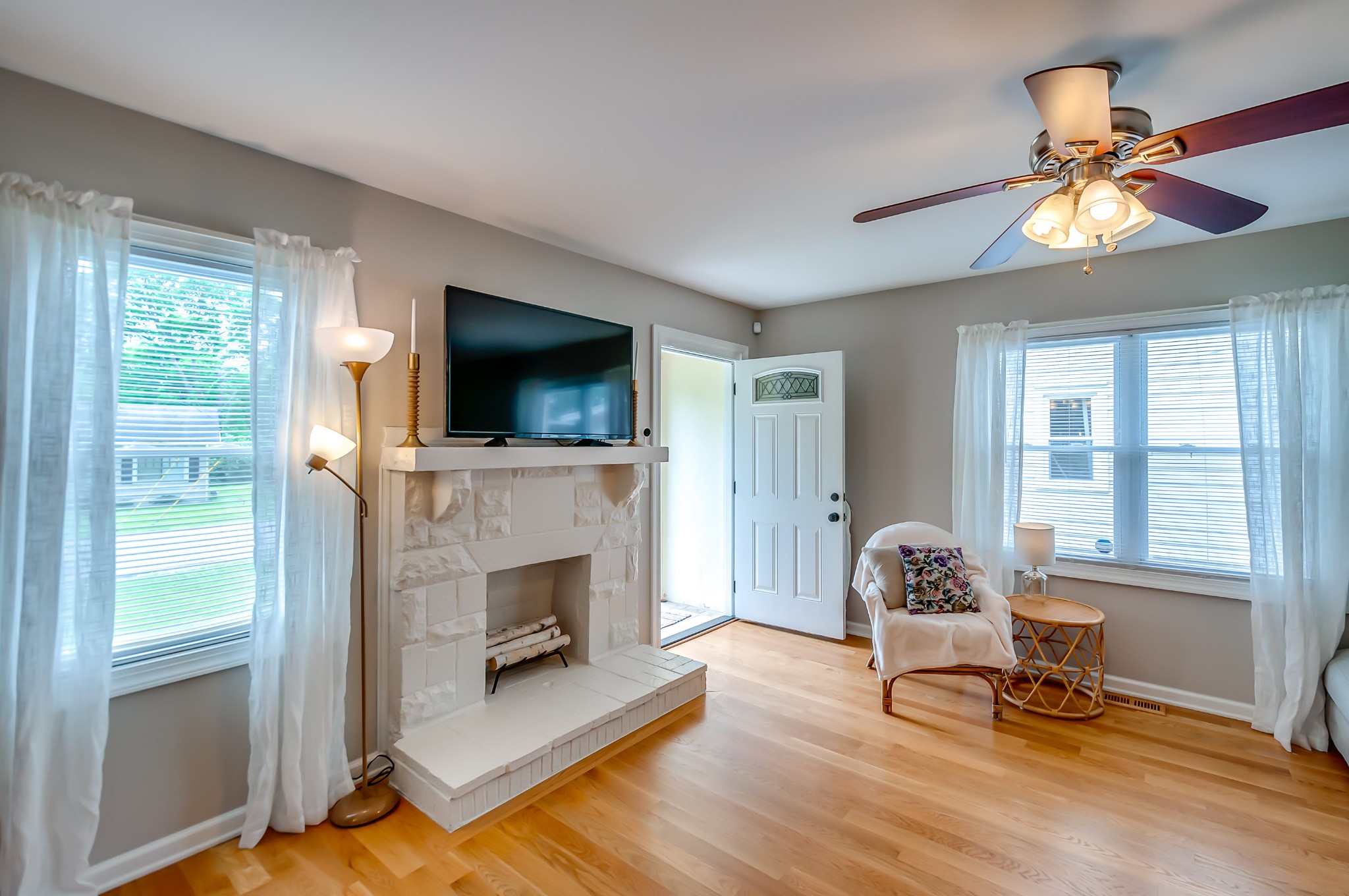 431 Maple Street Madison, TN 37115 - Photo 4 of 42 a living room with furniture and a fireplace