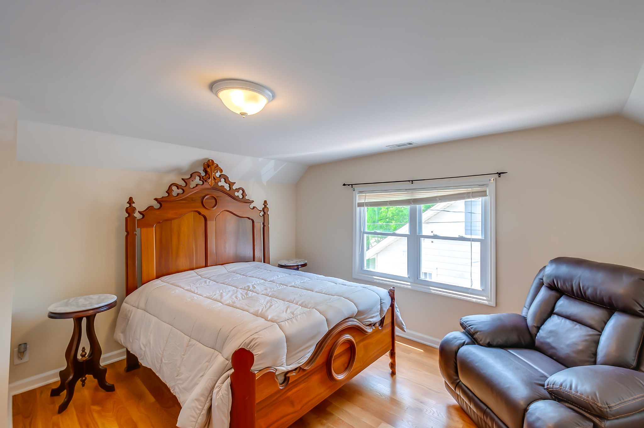 431 Maple Street Madison, TN 37115 - Photo 31 of 42 a bedroom with a bed and a couch