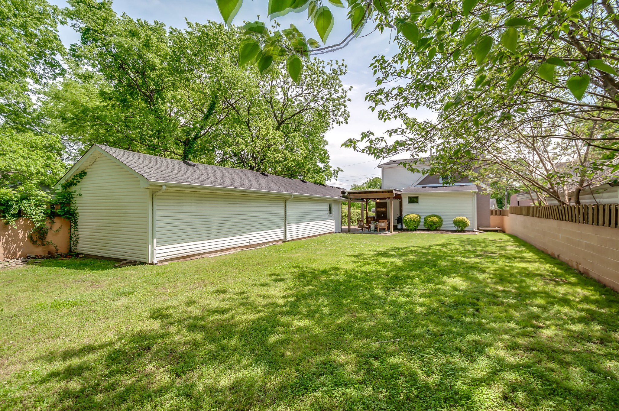 431 Maple Street Madison, TN 37115 - Photo 42 of 42 a backyard of a house with table and chairs