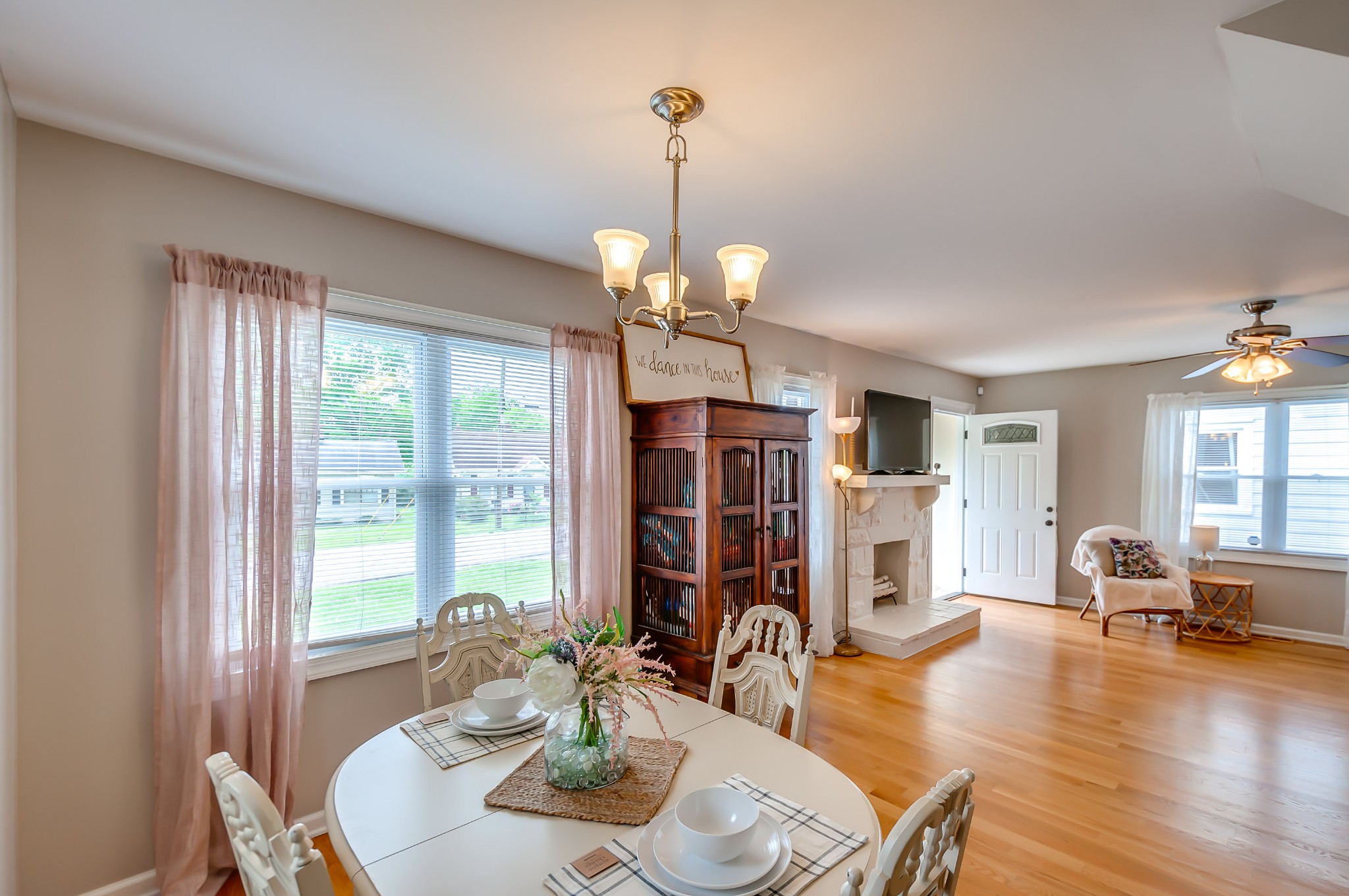 431 Maple Street Madison, TN 37115 - Photo 10 of 42 a view of a dining room with furniture window and wooden floor