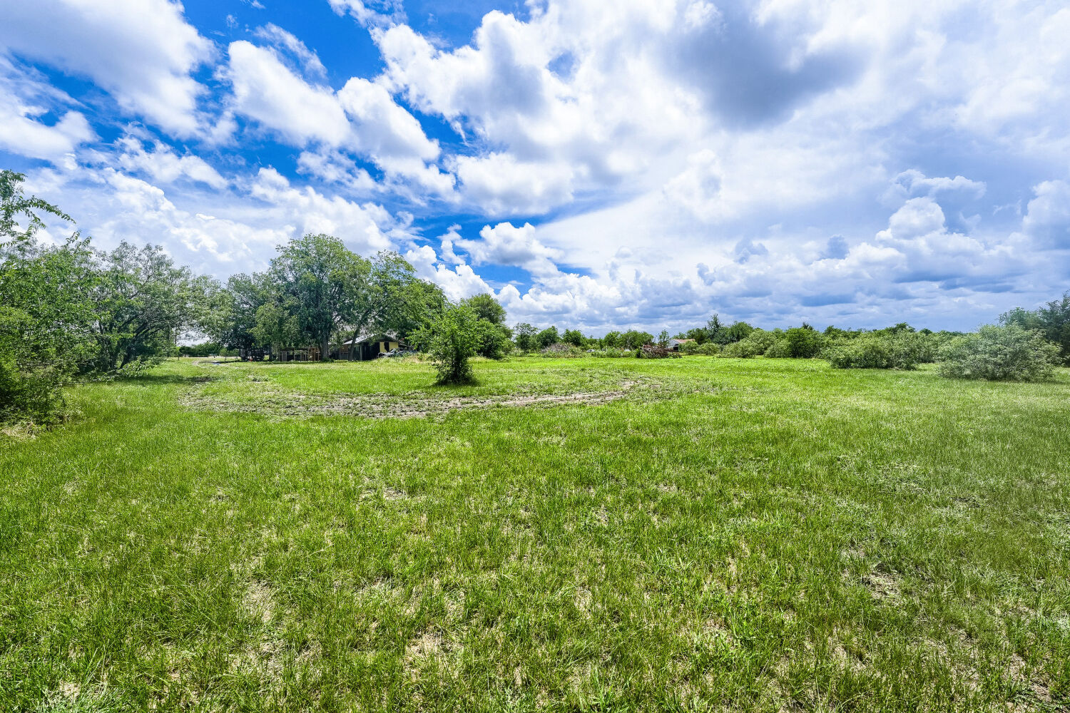 14520 Bois-D-Arc Road Manor, TX 78653 - Photo 16 of 21 a view of a city with lush green forest