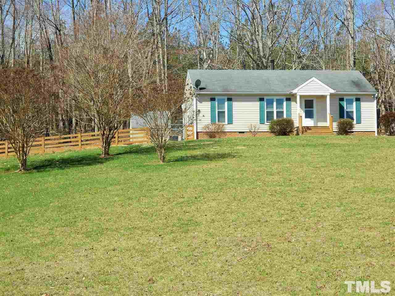 4535 Sugar Maple Road Oxford, NC 27565 - Photo 1 of 25 a front view of a house with a garden