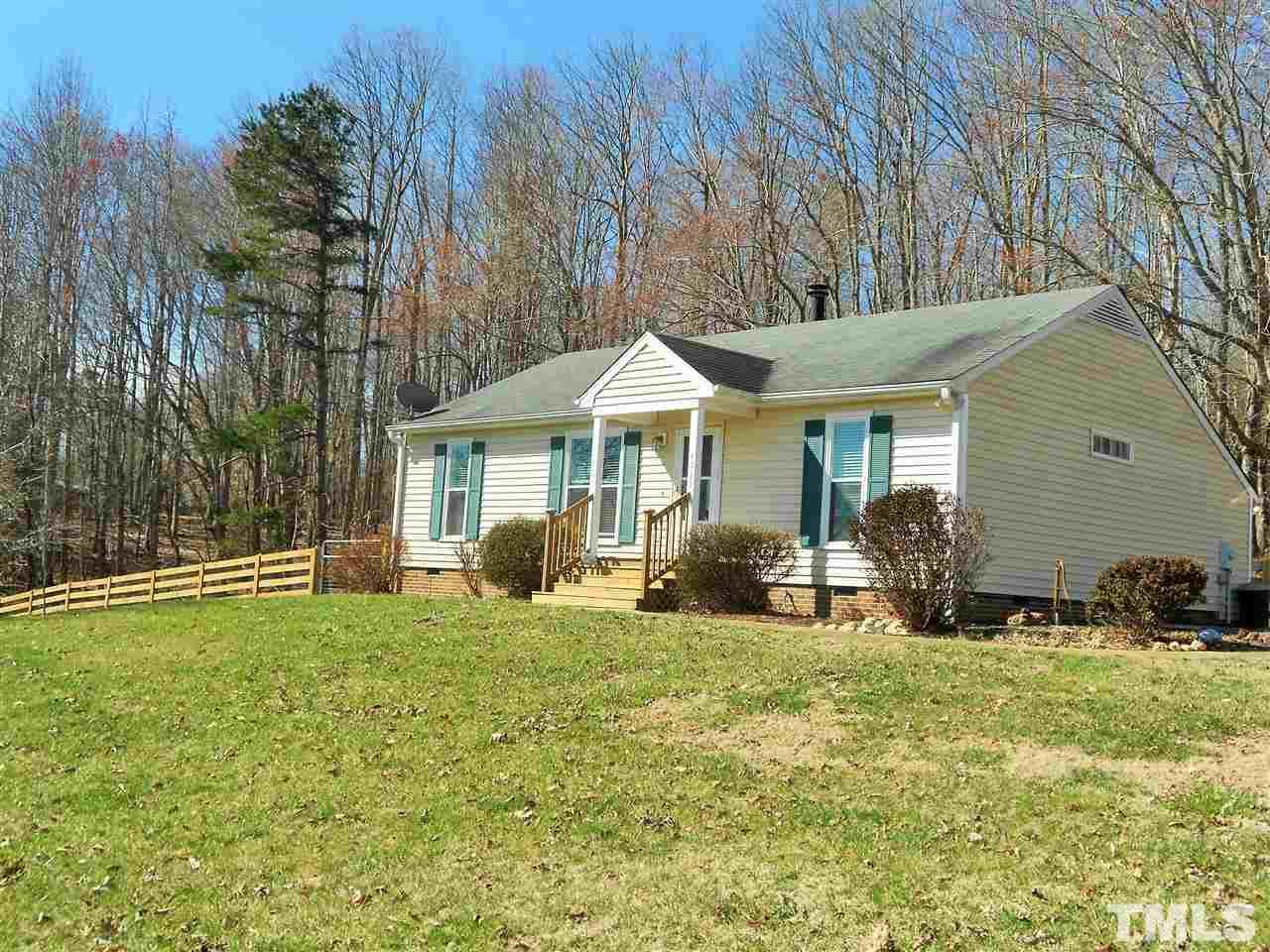 4535 Sugar Maple Road Oxford, NC 27565 - Photo 2 of 25 a front view of house with yard and green space