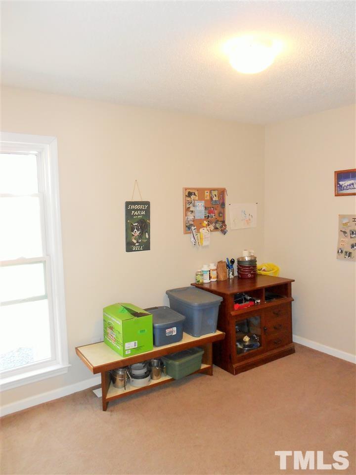 4535 Sugar Maple Road Oxford, NC 27565 - Photo 15 of 25 a living room with furniture and a window