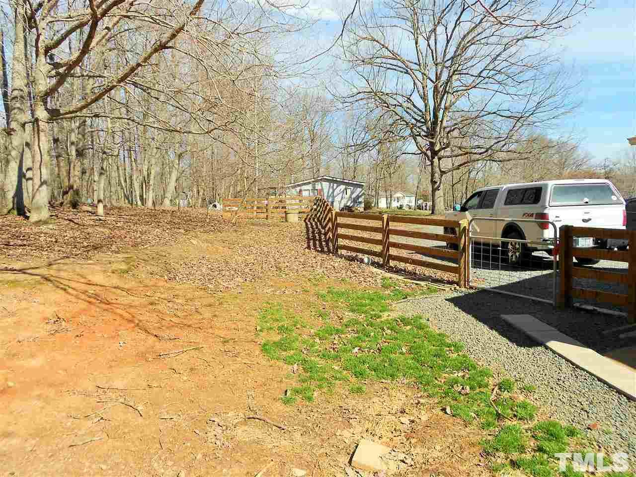 4535 Sugar Maple Road Oxford, NC 27565 - Photo 18 of 25 a view of a yard with trees