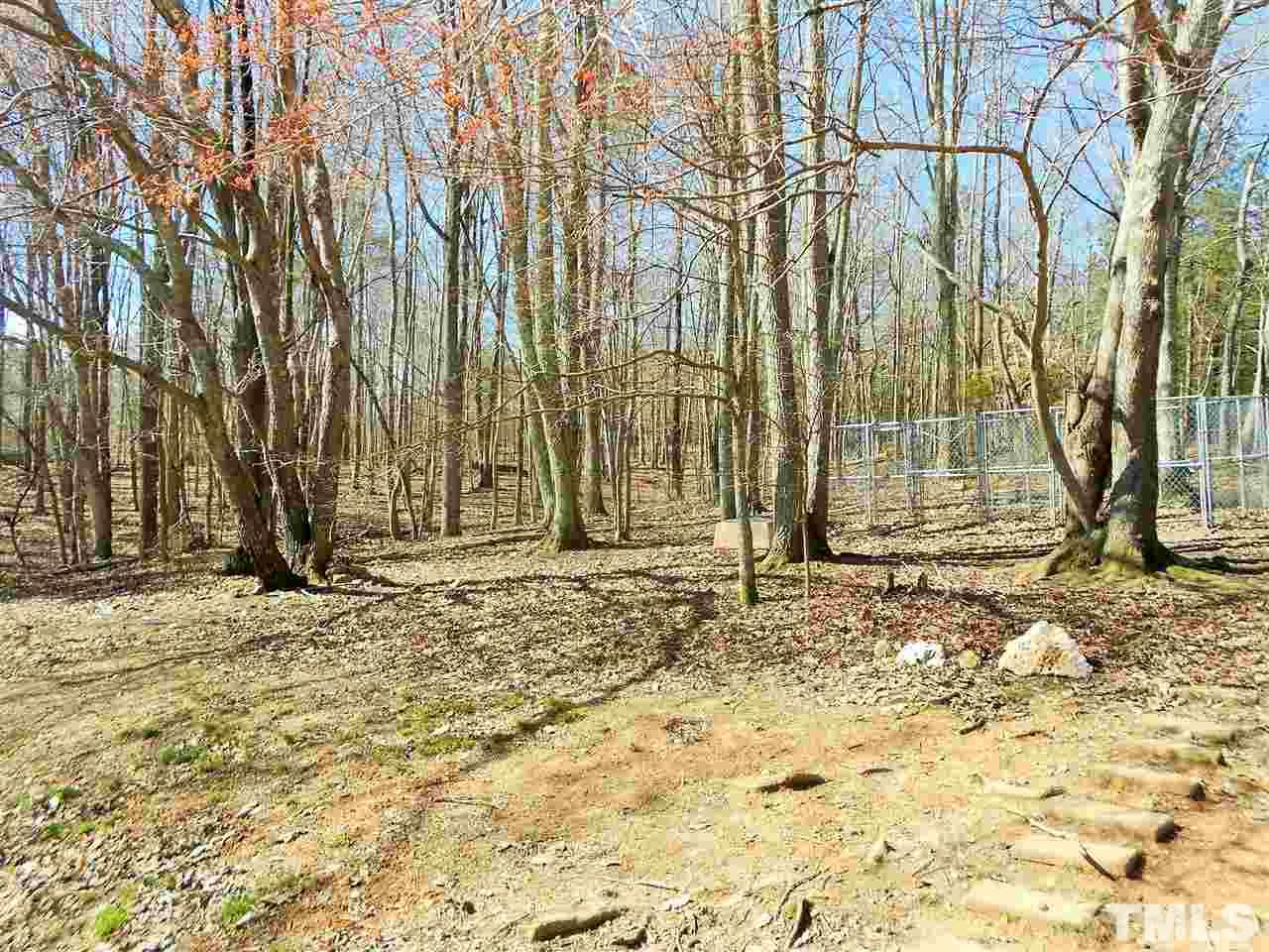 4535 Sugar Maple Road Oxford, NC 27565 - Photo 19 of 25 a view of a backyard of the house