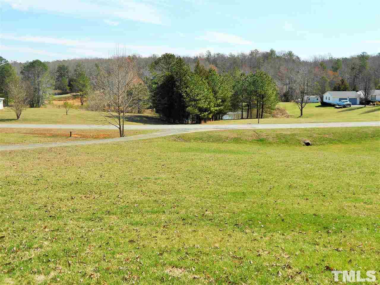 4535 Sugar Maple Road Oxford, NC 27565 - Photo 22 of 25 a view of a lake view with mountain in the background