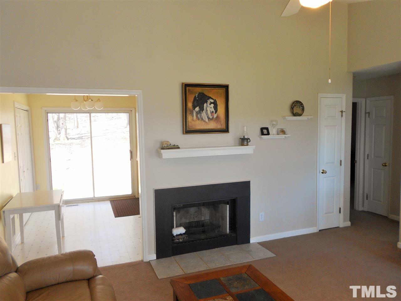 4535 Sugar Maple Road Oxford, NC 27565 - Photo 5 of 25 a living room with furniture and a fireplace