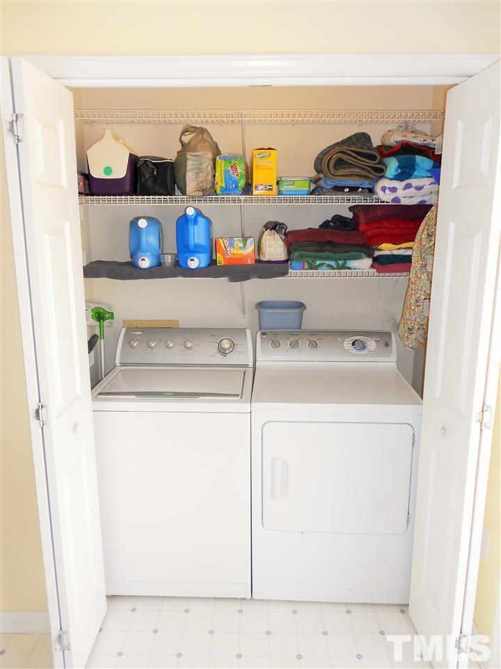 4535 Sugar Maple Road Oxford, NC 27565 - Photo 9 of 25 a utility room with dryer and washer