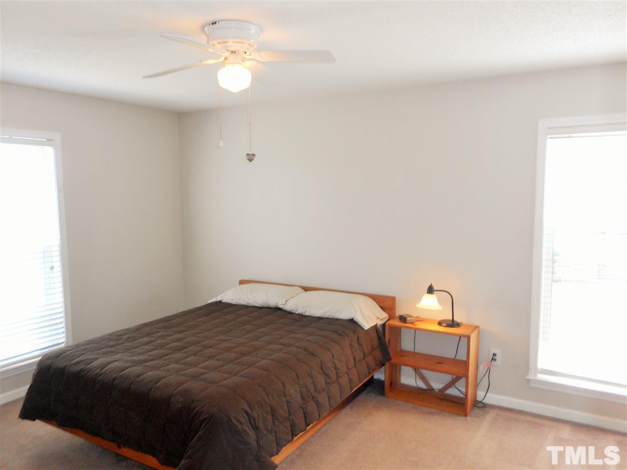4535 Sugar Maple Road Oxford, NC 27565 - Photo 10 of 25 a bedroom with a bed and a window