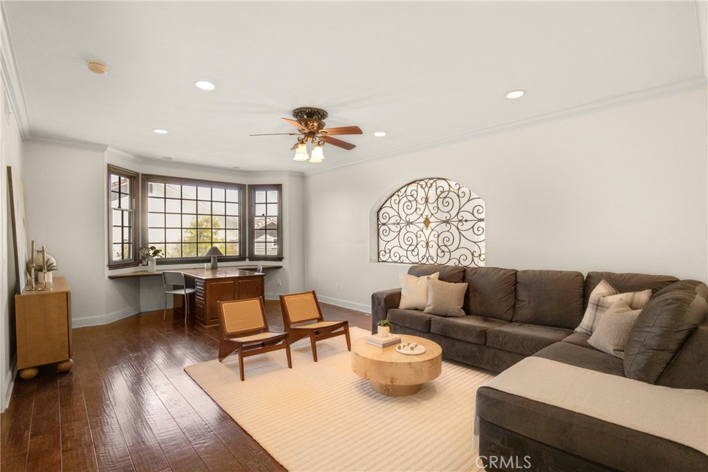 6032 Grey Rock Road Agoura Hills, CA 91301 - Photo 28 of 54 a living room with furniture and a large window
