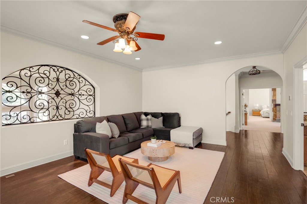 6032 Grey Rock Road Agoura Hills, CA 91301 - Photo 29 of 54 a living room with furniture and a wooden floor