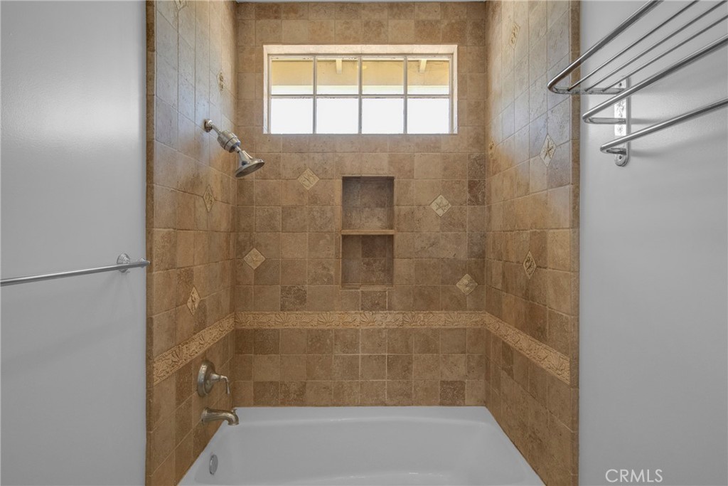 6032 Grey Rock Road Agoura Hills, CA 91301 - Photo 32 of 54 a bathroom with a shower