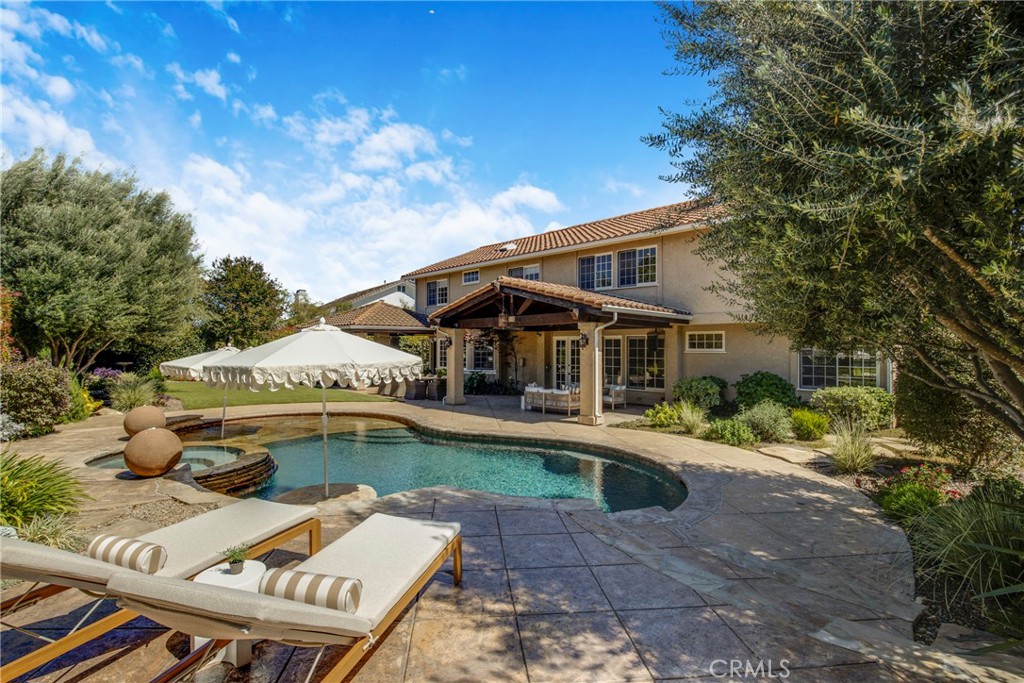 6032 Grey Rock Road Agoura Hills, CA 91301 - Photo 38 of 54 a front view of a house with swimming pool