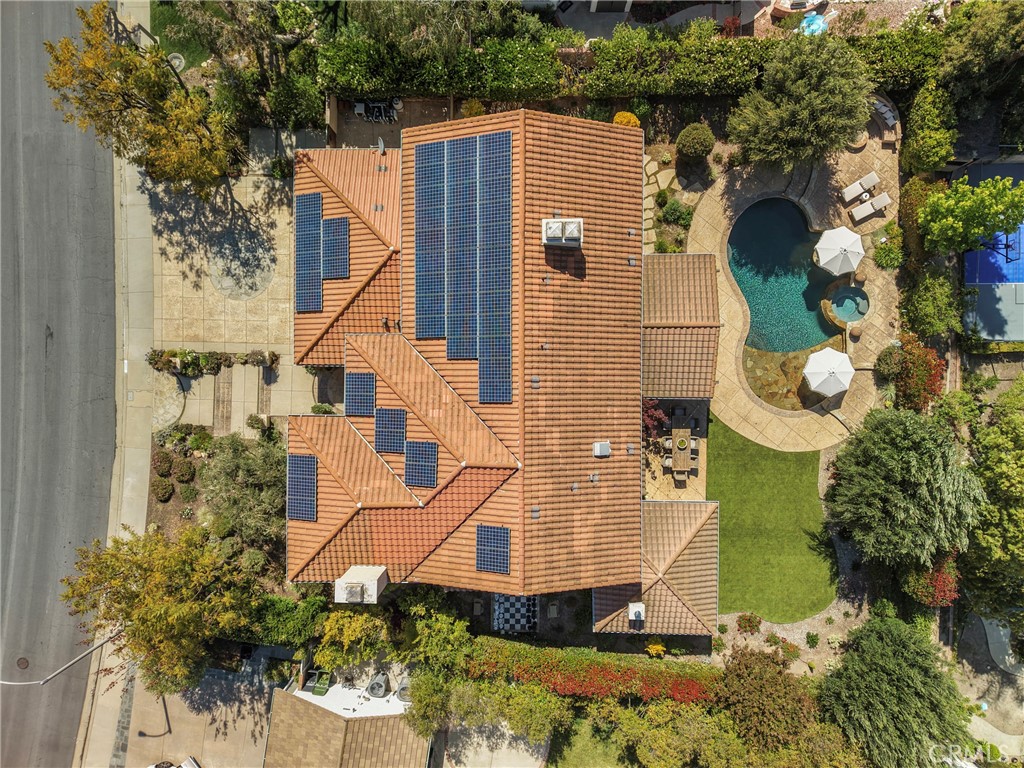 6032 Grey Rock Road Agoura Hills, CA 91301 - Photo 49 of 54 an aerial view of a house with a yard and large trees