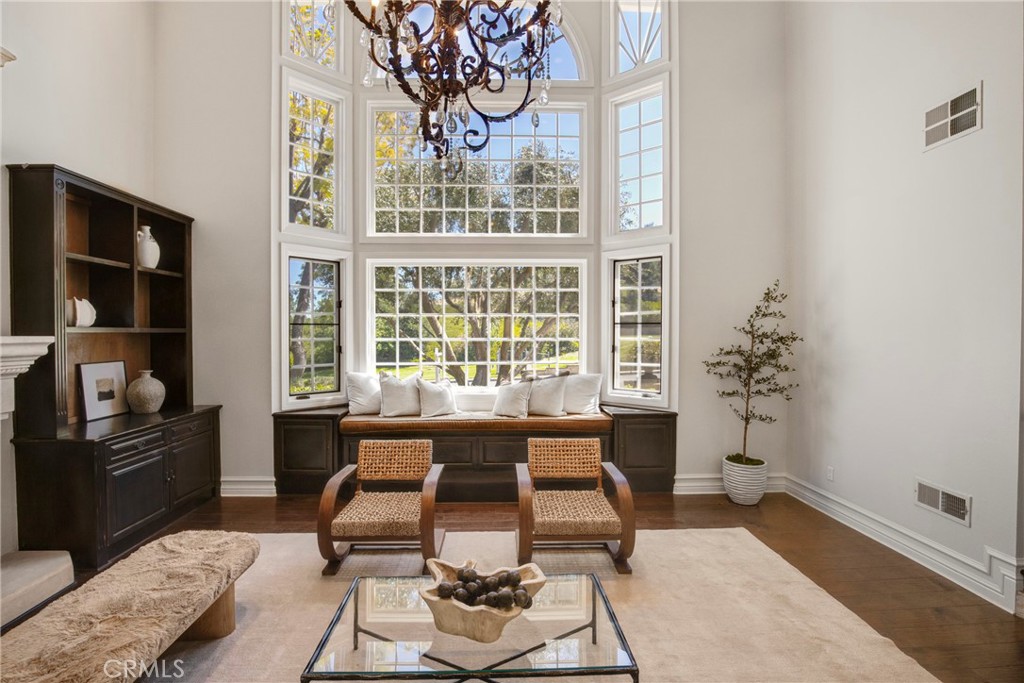 6032 Grey Rock Road Agoura Hills, CA 91301 - Photo 8 of 54 a living room with furniture and a window