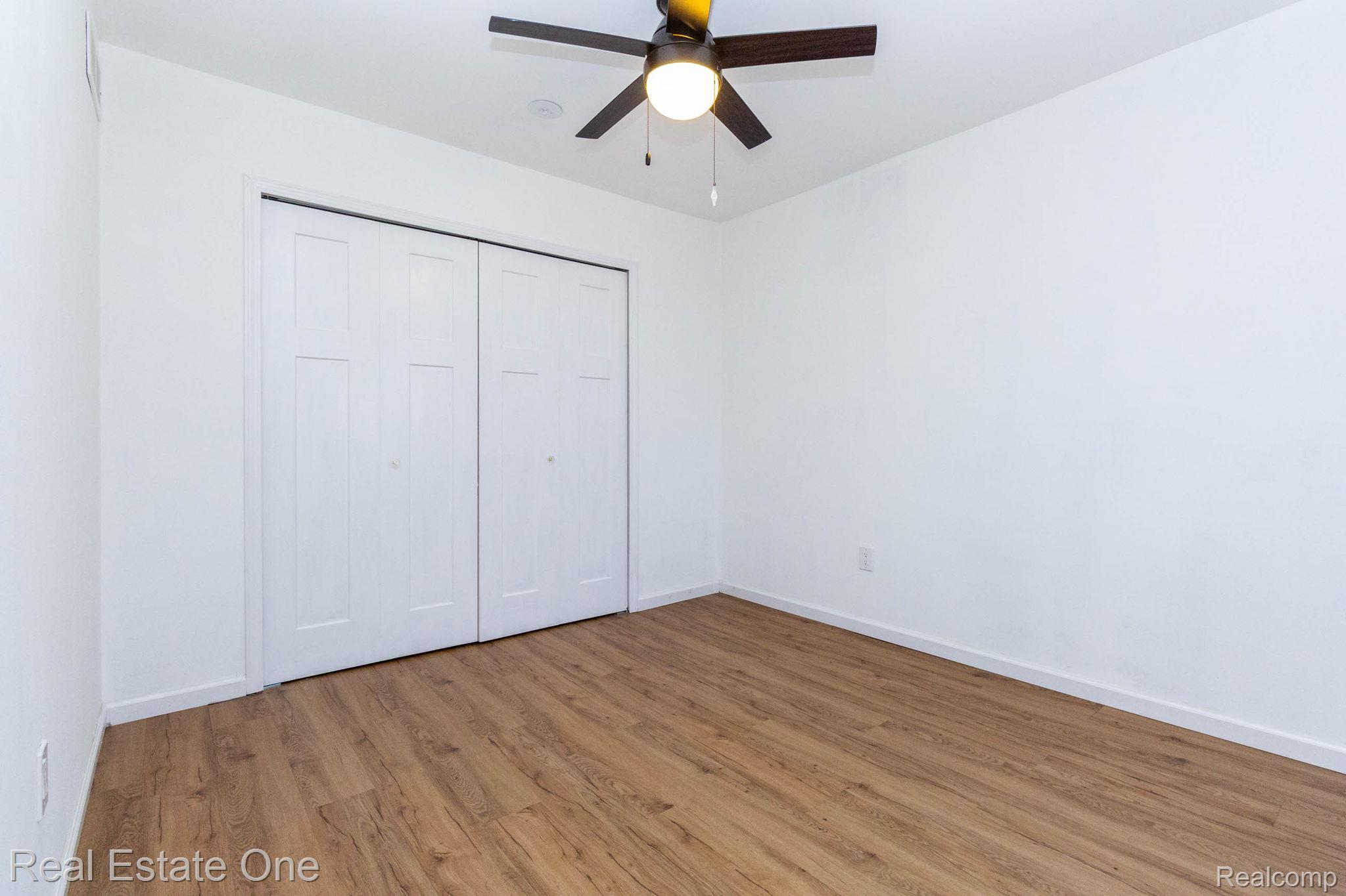 111 Manor Way Rochester, MI 48309 - Photo 21 of 36 Room featuring wood-finish flooring and white walls