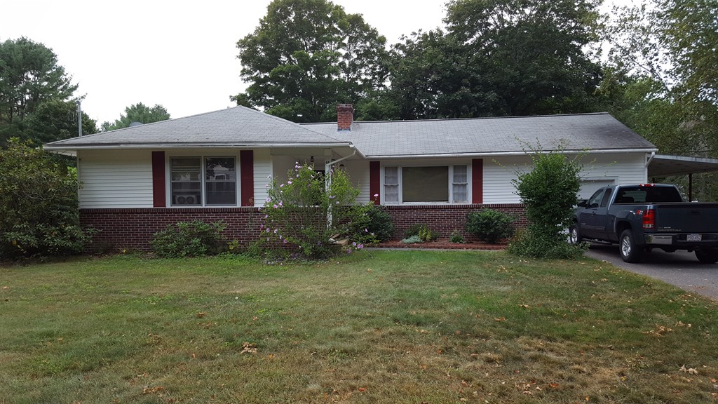 44 Greenwich Road Ware, MA 01082 - Photo 1 of 6 a front view of a house with garden