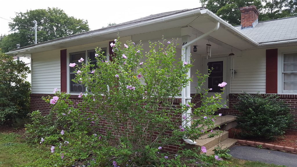 44 Greenwich Road Ware, MA 01082 - Photo 3 of 6 a front view of a house with garden