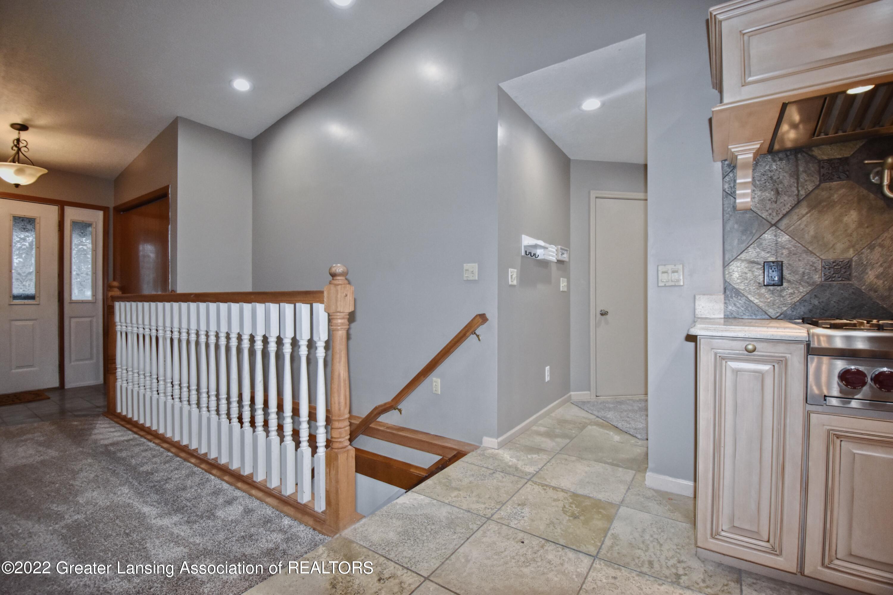 299 Ives Road Mason, MI 48854 - Photo 28 of 38 Basement Stairs