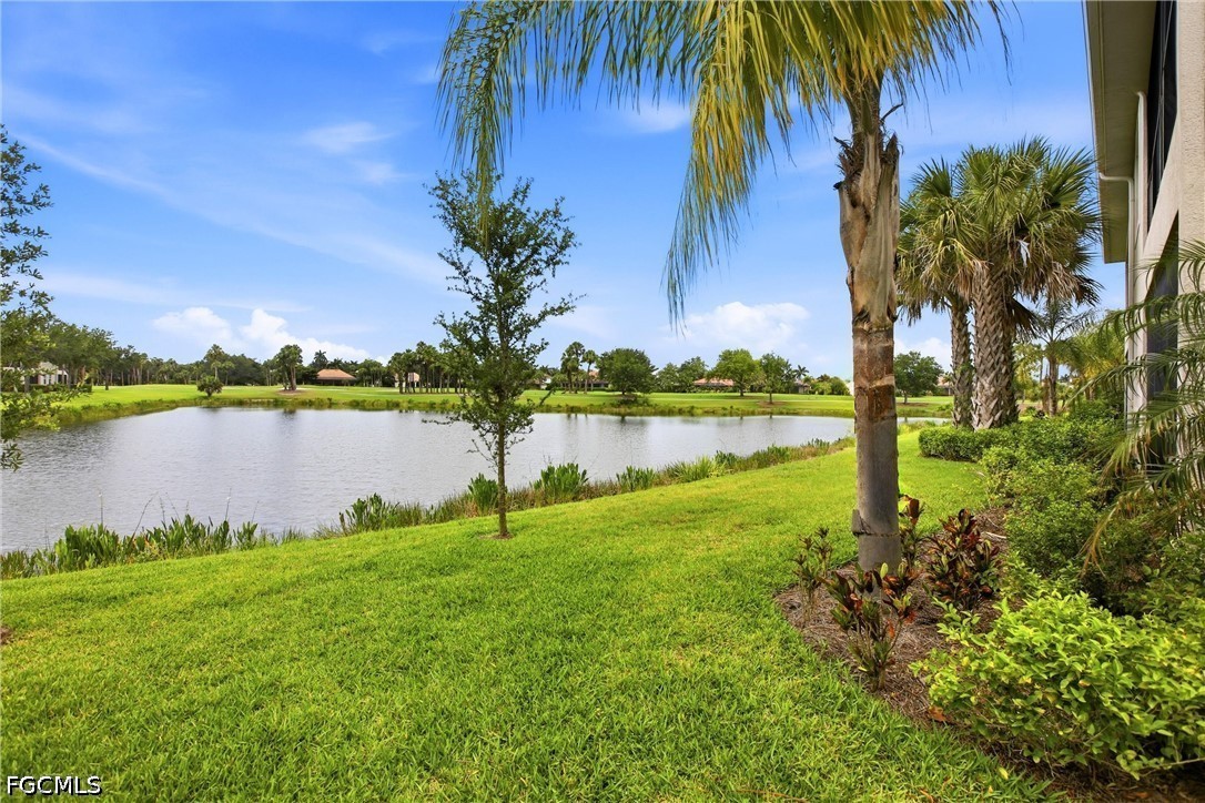 3751 Pebblebrook Ridge Court, Unit 101 Fort Myers, FL 33905 - Photo 42 of 48 a lake with palm trees