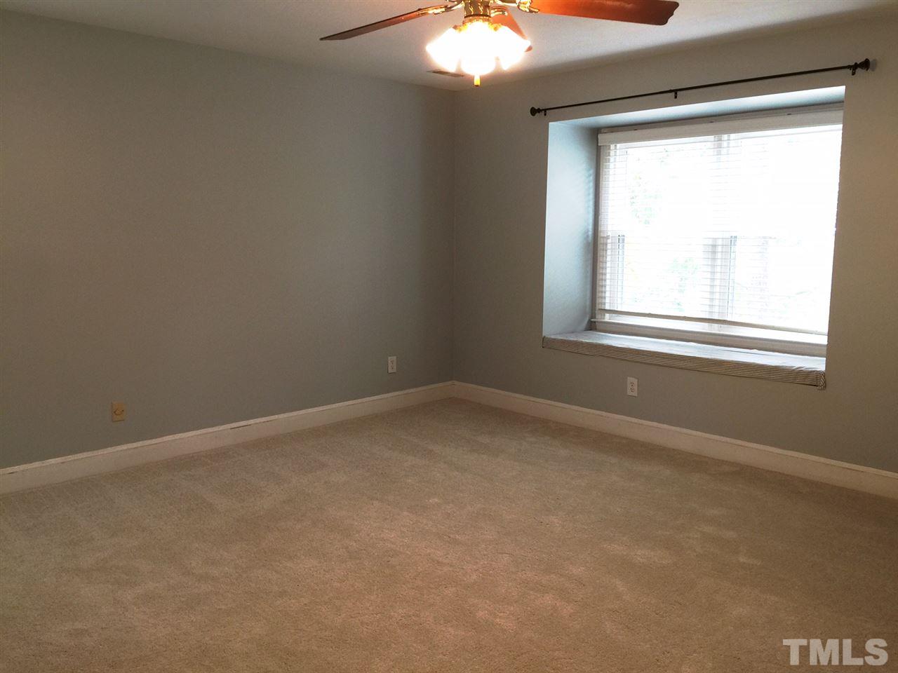 1900 Wilton Circle Raleigh, NC 27615 - Photo 7 of 9 an empty room with a window