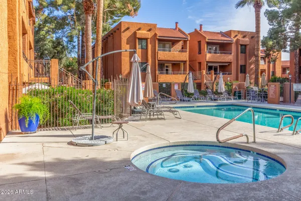 a view of a building with a swimming pool