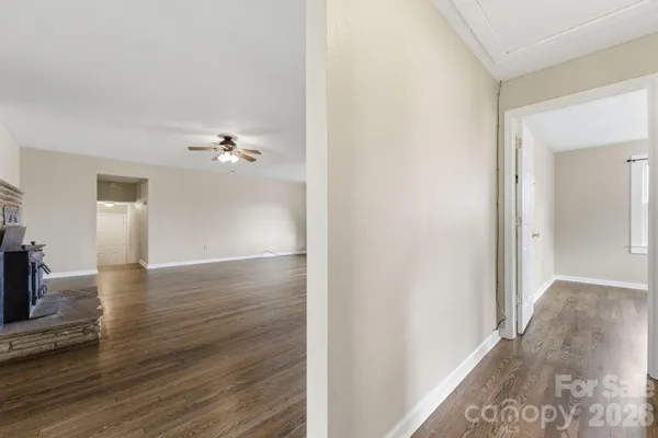 a view of a livingroom with wooden floor