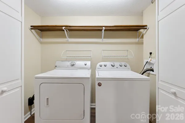 a utility room with dryer and washer