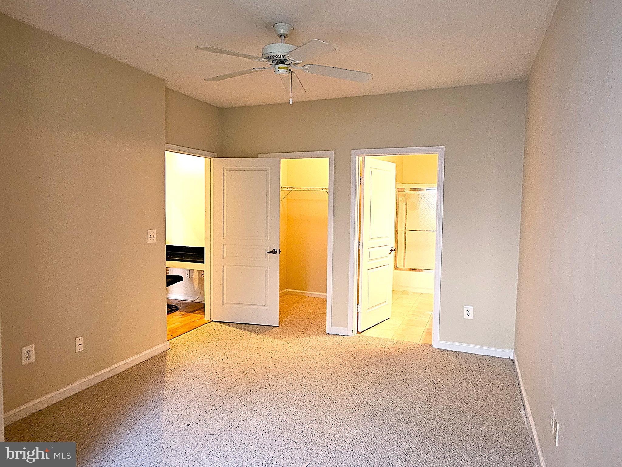 12000 Market Street, Unit 283 Reston, VA 20190 - Photo 22 of 36 a view of an empty room with a window