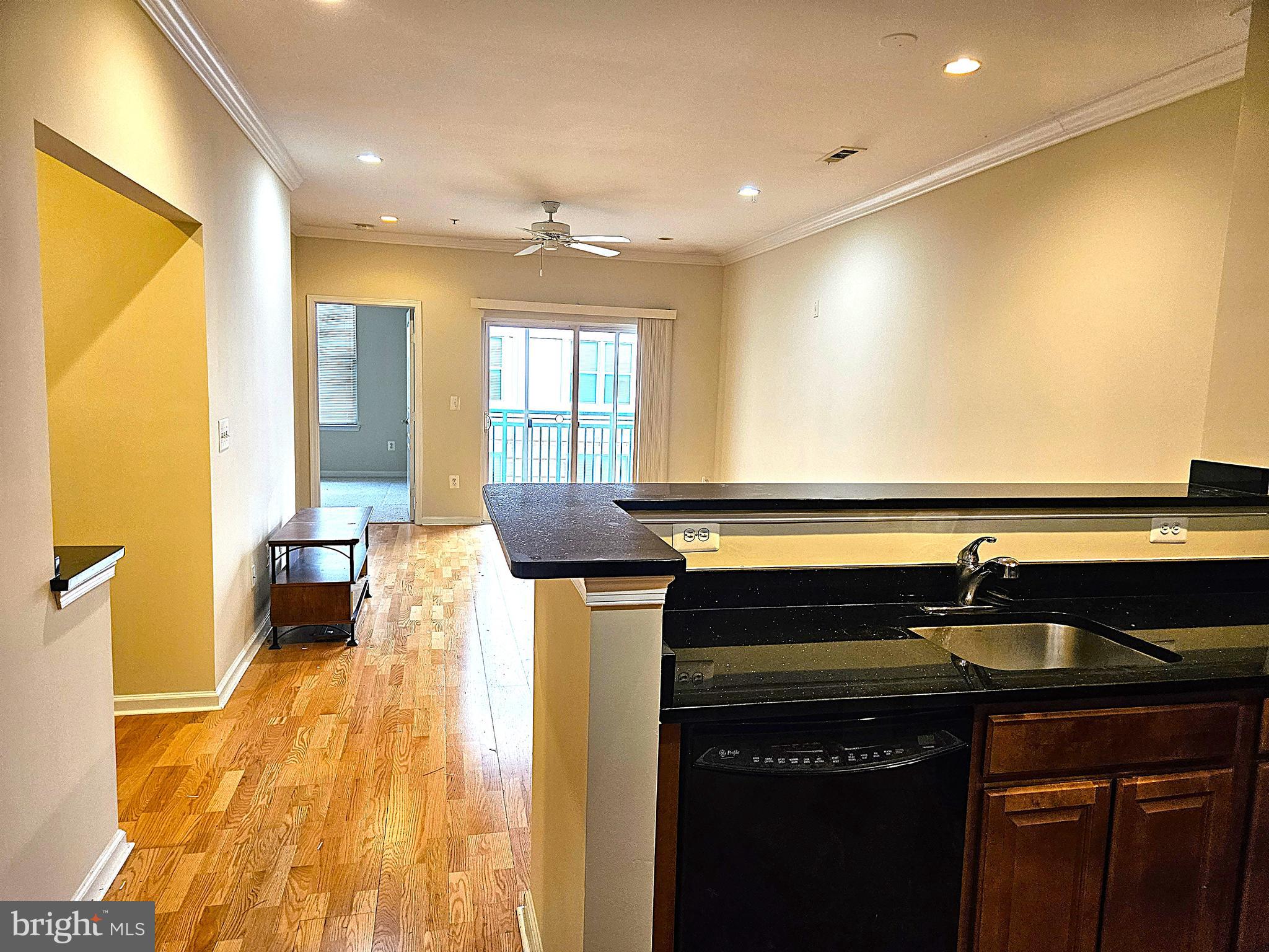 12000 Market Street, Unit 283 Reston, VA 20190 - Photo 26 of 36 a kitchen with a sink and cabinets